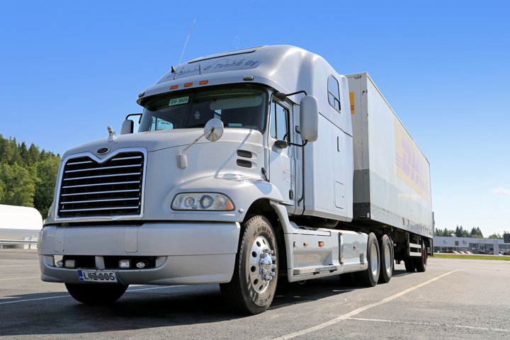 FORSSA, FINLAND - JULY 4 2015: Grey Mack Vision semi truck parked. Due to truck and trailer lenght regulations conventional Mack trucks are uncommon in Finland.